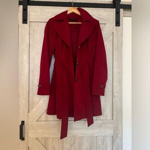 Classic, rich red trench coat with hood